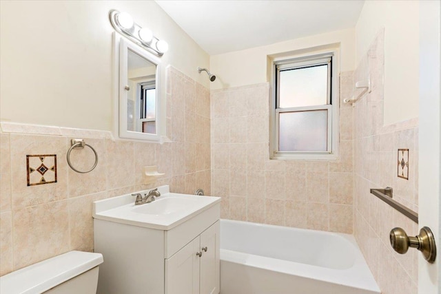280 Collins Ave Unit 6J, Mount Vernon, NY 10552 - bathroom with toilet, vanity, tub / shower combination, and tile walls