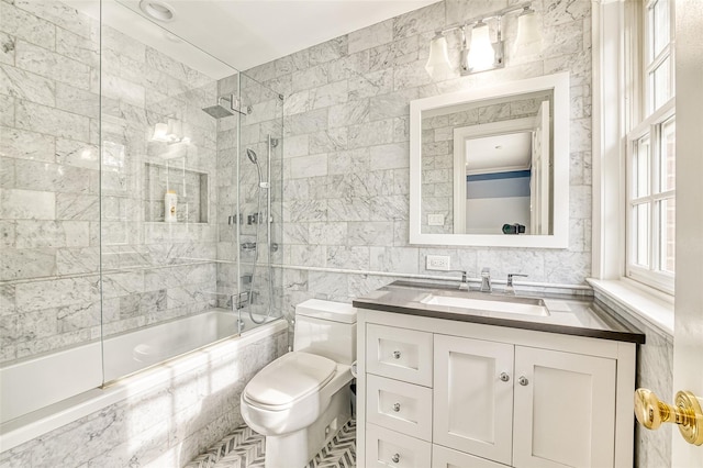 9 Stream Ct, Great Neck, NY 11024 - bathroom featuring tile walls, tiled shower / bath combo, toilet, and vanity