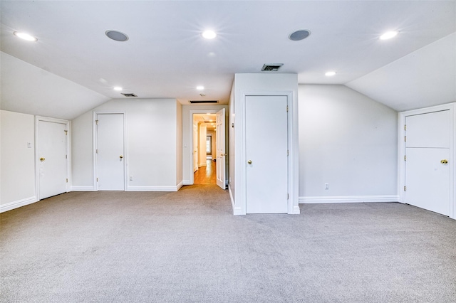 9 Stream Ct, Great Neck, NY 11024 - bonus room featuring lofted ceiling, carpet flooring, baseboards, and recessed lighting