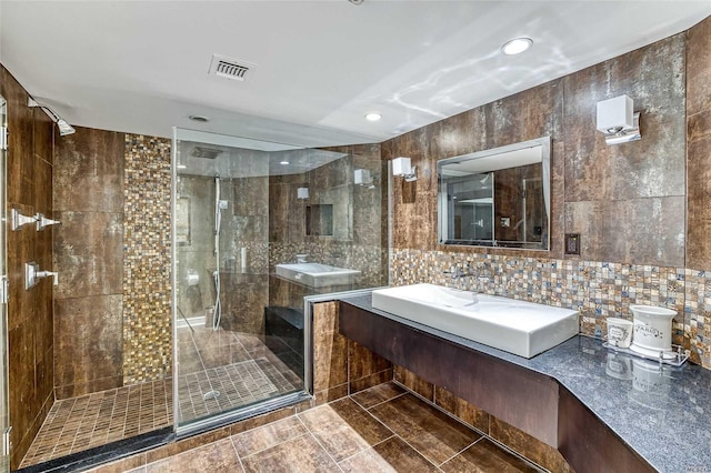 9 Stream Ct, Great Neck, NY 11024 - full bath featuring a shower stall, vanity, recessed lighting, backsplash, and tile walls