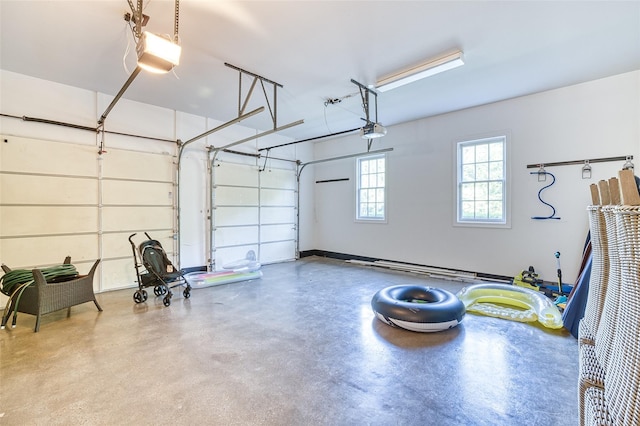 9 Stream Ct, Great Neck, NY 11024 - garage featuring a garage door opener