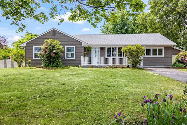 1 Chuck Ln, Selden, NY 11784 - single story home featuring a porch, a front lawn, and asphalt driveway