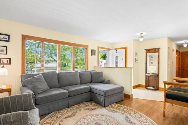 1 Chuck Ln, Selden, NY 11784 - living room featuring light wood-style floors and baseboards