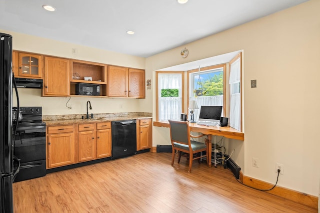 1 Chuck Ln, Selden, NY 11784 - kitchen featuring black appliances, extractor fan, light wood-style flooring, a sink, and open shelves