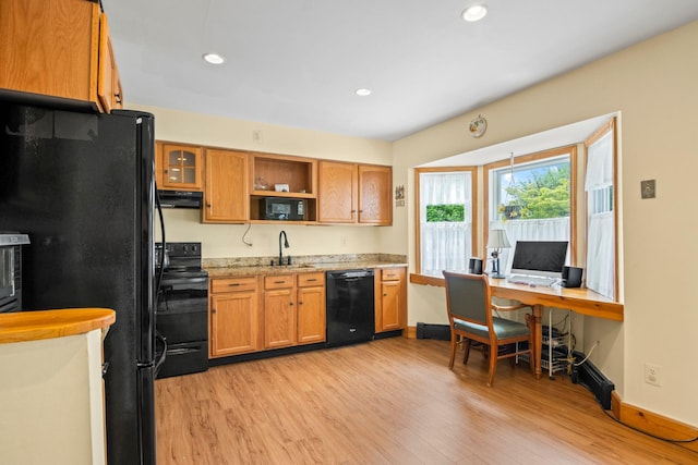 1 Chuck Ln, Selden, NY 11784 - kitchen featuring black appliances, a sink, exhaust hood, light wood-type flooring, and recessed lighting