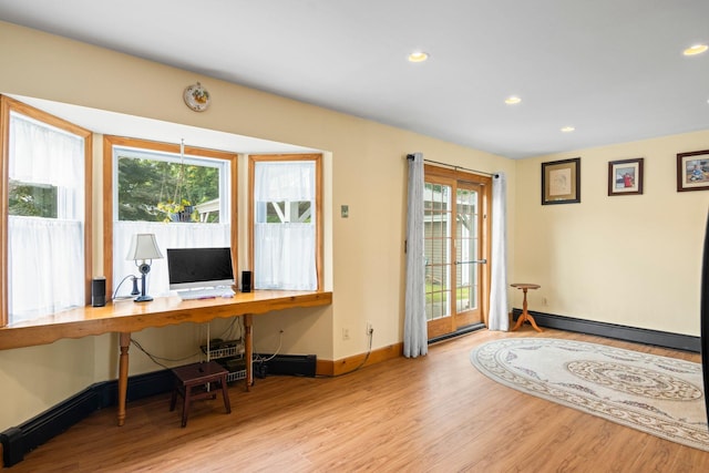 1 Chuck Ln, Selden, NY 11784 - office with wood finished floors, baseboards, baseboard heating, and recessed lighting