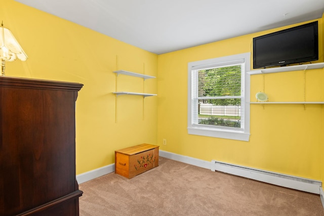 1 Chuck Ln, Selden, NY 11784 - unfurnished bedroom featuring a baseboard radiator, carpet flooring, and baseboards