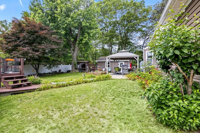 1 Chuck Ln, Selden, NY 11784 - view of yard with a gazebo, a carport, a wooden deck, and a patio area