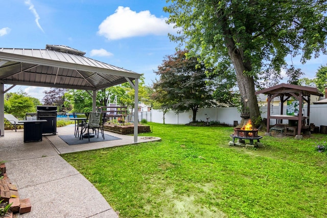1 Chuck Ln, Selden, NY 11784 - view of yard featuring a gazebo, a fire pit, and a patio