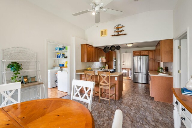 67 Keats Dr, New Windsor, NY 12553 - dining area featuring independent washer and dryer, a ceiling fan, and high vaulted ceiling