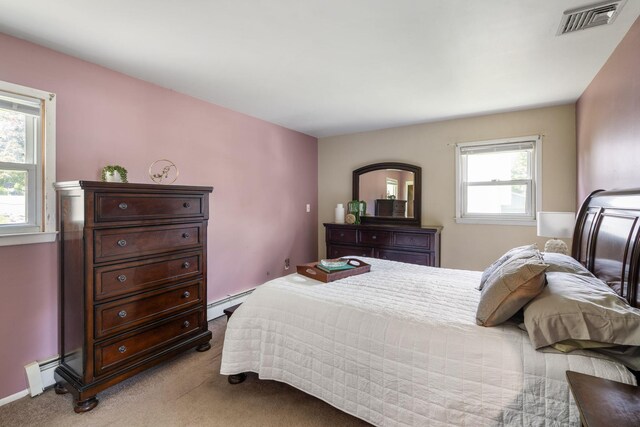 67 Keats Dr, New Windsor, NY 12553 - bedroom featuring a baseboard heating unit and light carpet