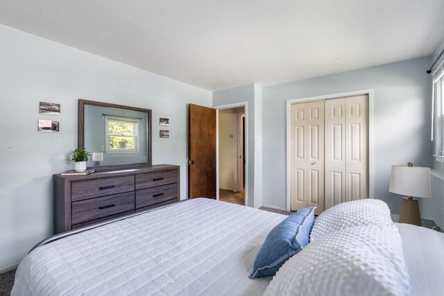 67 Keats Dr, New Windsor, NY 12553 - bedroom featuring a closet, baseboards, and carpet