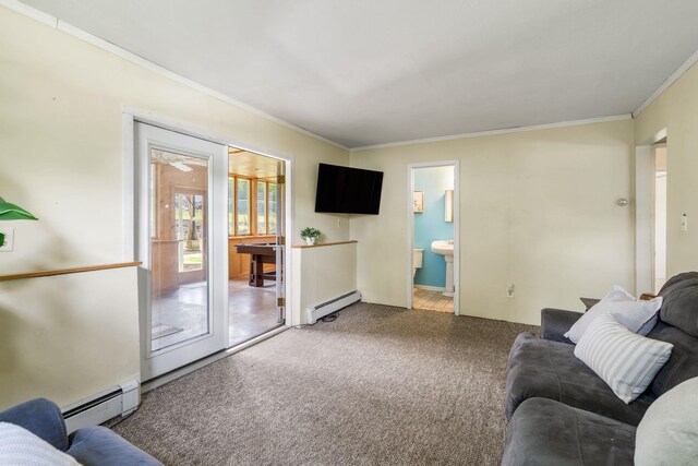 67 Keats Dr, New Windsor, NY 12553 - living room featuring a baseboard radiator, light carpet, and crown molding