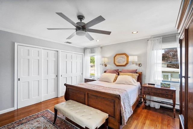 129 Colony Ln, Syosset, NY 11791 - bedroom with multiple closets, crown molding, wood finished floors, recessed lighting, and a ceiling fan
