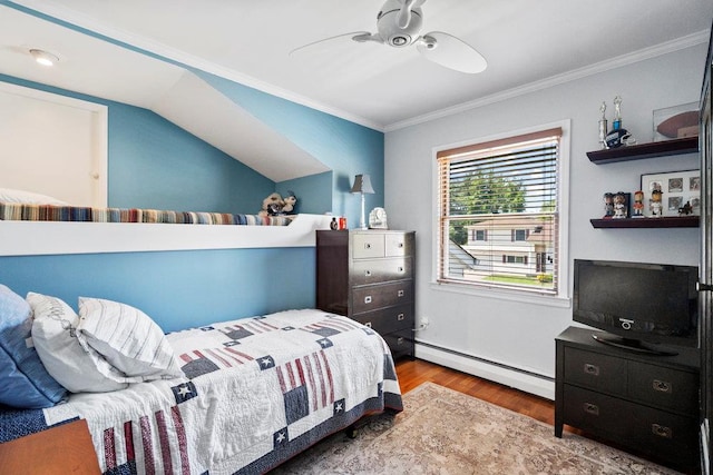 129 Colony Ln, Syosset, NY 11791 - bedroom featuring a baseboard heating unit, wood finished floors, ornamental molding, and ceiling fan