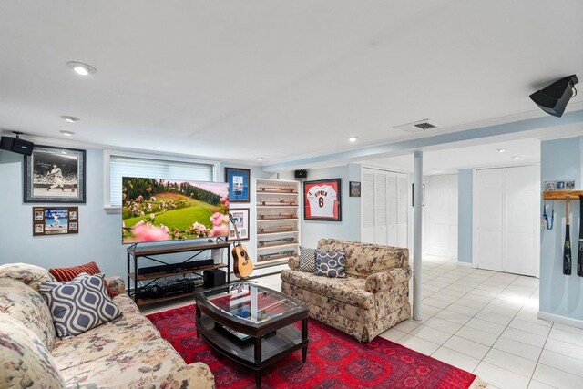 129 Colony Ln, Syosset, NY 11791 - living room featuring light tile patterned floors, ornamental molding, and recessed lighting
