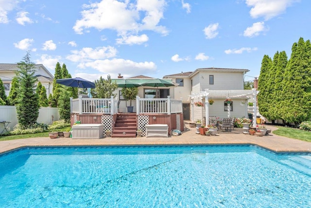 129 Colony Ln, Syosset, NY 11791 - view of pool with a pergola, a deck, and a patio area