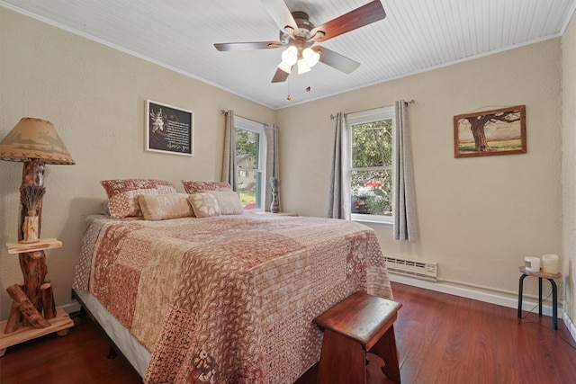 34 Argyle St, Lake Peekskill, NY 10537 - bedroom with a baseboard heating unit, crown molding, dark wood-style flooring, baseboards, and ceiling fan