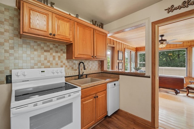 34 Argyle St, Lake Peekskill, NY 10537 - kitchen featuring white appliances, a sink, plenty of natural light, and dark wood-style flooring