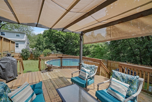 34 Argyle St, Lake Peekskill, NY 10537 - wooden deck with area for grilling and view of wooded area