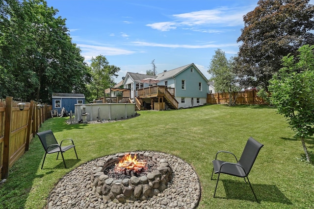 34 Argyle St, Lake Peekskill, NY 10537 - view of yard featuring a wooden deck, an outdoor fire pit, and stairs