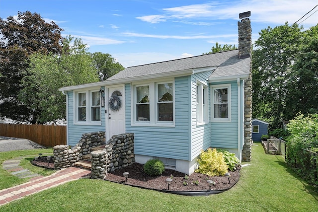 34 Argyle St, Lake Peekskill, NY 10537 - bungalow-style home with a chimney and a shingled roof