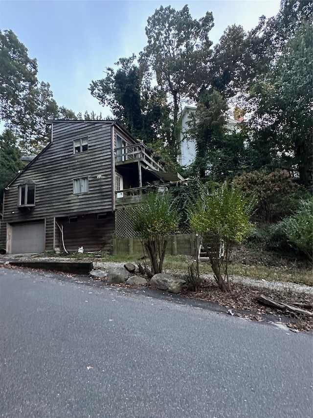 90 Landing Rd, Miller Place, NY 11764 - view of side of home with an attached garage