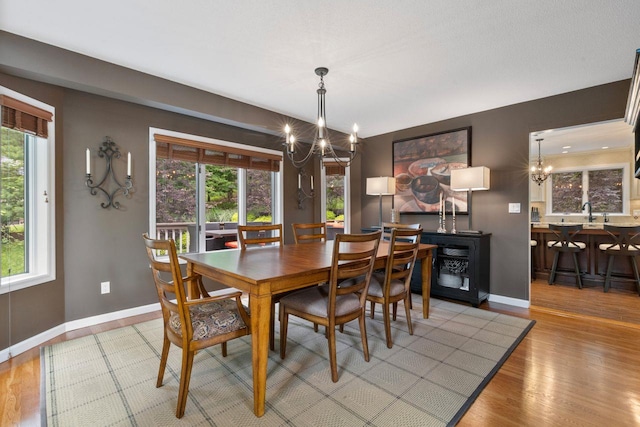 226 Briarwood Dr, Somers, NY 10589 - dining area featuring a chandelier and wood finished floors