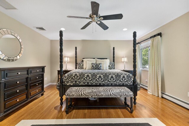 226 Briarwood Dr, Somers, NY 10589 - bedroom with light wood finished floors, recessed lighting, a ceiling fan, and a baseboard radiator