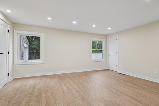 1293 Pulaski Rd, East Northport, NY 11731 - unfurnished room featuring light wood-style flooring, recessed lighting, and baseboards