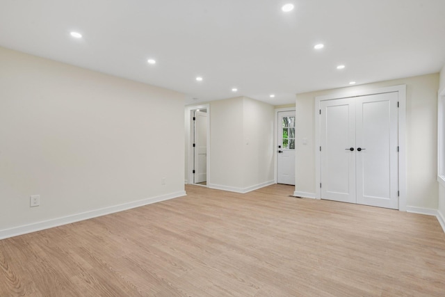 1293 Pulaski Rd, East Northport, NY 11731 - unfurnished bedroom with recessed lighting, light wood finished floors, and baseboards