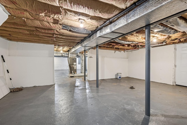 1293 Pulaski Rd, East Northport, NY 11731 - unfinished basement with heating unit