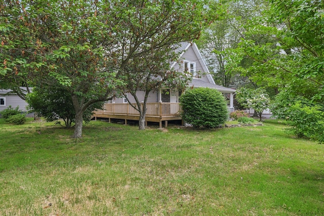 1293 Pulaski Rd, East Northport, NY 11731 - view of grassy yard featuring a deck