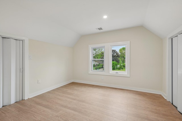 1293 Pulaski Rd, East Northport, NY 11731 - bonus room featuring lofted ceiling, light wood-type flooring, and recessed lighting
