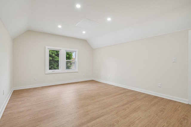 1293 Pulaski Rd, East Northport, NY 11731 - additional living space featuring vaulted ceiling, light wood-style floors, and recessed lighting