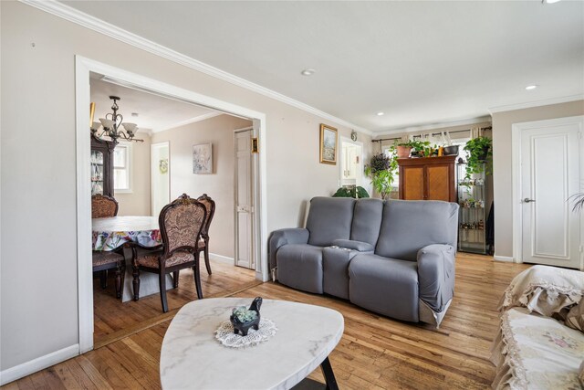 117 Ocean Ave, Massapequa Park, NY 11762 - living room with a chandelier, ornamental molding, light wood finished floors, baseboards, and recessed lighting