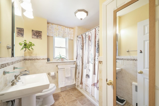 131-2 S Highland Ave Unit A3, Ossining, NY 10562 - full bathroom featuring tile walls, toilet, tile patterned flooring, curtained shower, and a wainscoted wall