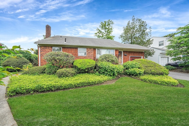 3 Shelter Hill Rd, Plainview, NY 11803 - view of front of home with a garage, a chimney, a front yard, and brick siding
