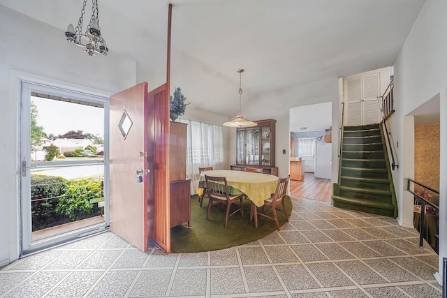 3 Shelter Hill Rd, Plainview, NY 11803 - dining area featuring stairway and high vaulted ceiling
