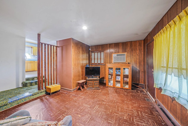 3 Shelter Hill Rd, Plainview, NY 11803 - living room with wooden walls and a wall unit AC