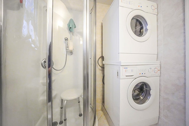 3 Shelter Hill Rd, Plainview, NY 11803 - laundry room featuring stacked washing machine and dryer