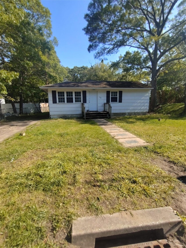 54 Meadowmere Ave, Mastic Beach, NY 11950 - ranch-style home featuring a front lawn
