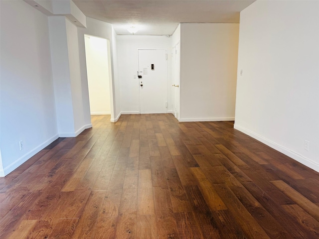 43-10 Kissena Blvd Unit 2B, Flushing, NY 11355 - empty room with dark wood finished floors and baseboards
