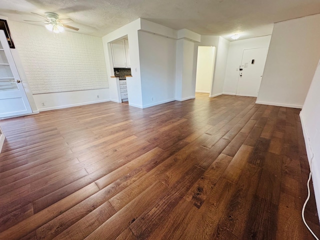 43-10 Kissena Blvd Unit 2B, Flushing, NY 11355 - unfurnished living room with a ceiling fan, wood finished floors, and baseboards