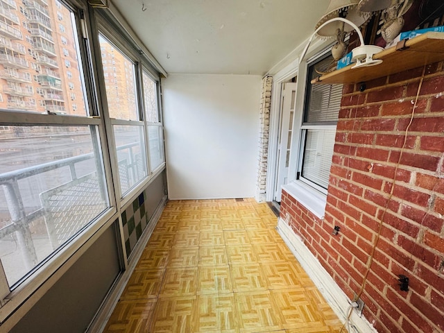 43-10 Kissena Blvd Unit 2B, Flushing, NY 11355 - unfurnished sunroom with brick wall