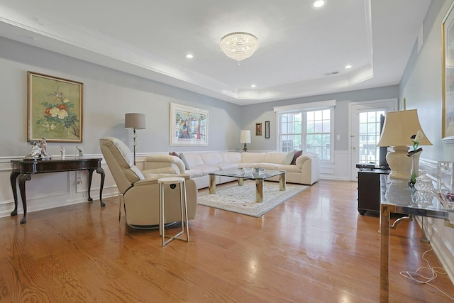 24 N De Baun Ave Unit 308, Suffern, NY 10901 - living area featuring a raised ceiling, wood finished floors, recessed lighting, a decorative wall, and a wainscoted wall