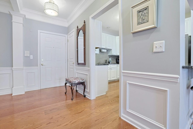 24 N De Baun Ave Unit 308, Suffern, NY 10901 - foyer entrance with crown molding and light wood-style flooring