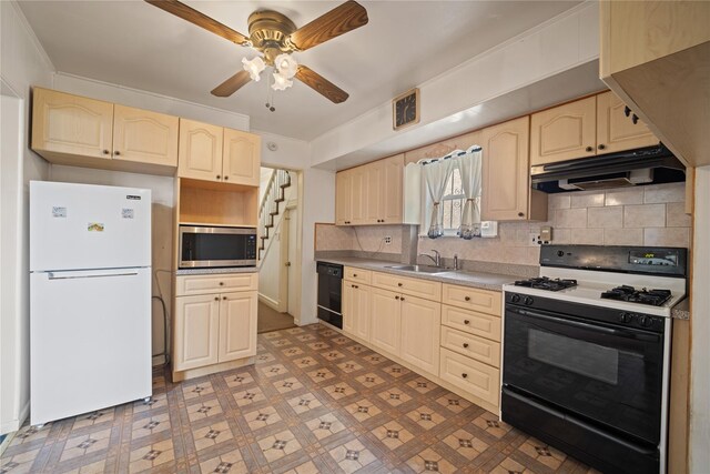 4614 Carpenter Ave, Bronx, NY 10470 - kitchen with black appliances, under cabinet range hood, ceiling fan, a sink, and tasteful backsplash