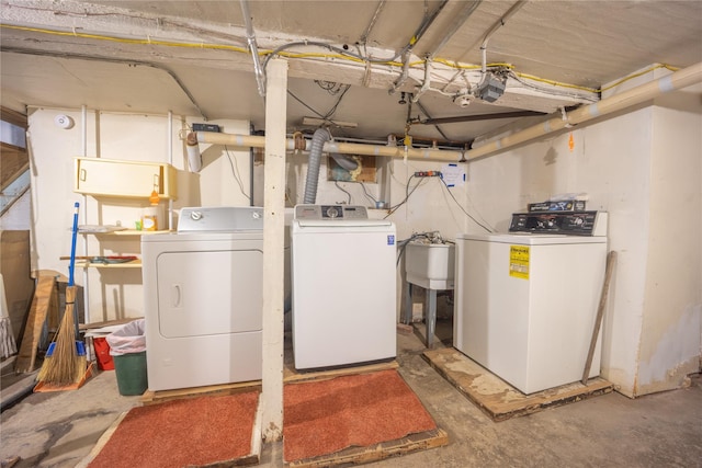 4614 Carpenter Ave, Bronx, NY 10470 - unfinished basement featuring washer and clothes dryer and a sink
