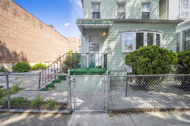 4614 Carpenter Ave, Bronx, NY 10470 - view of exterior entry with a gate